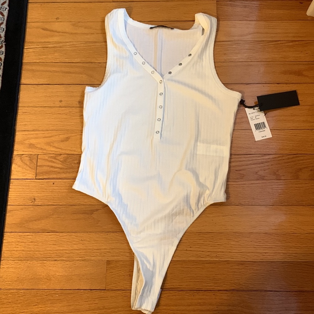 Women’s body suit. Size M